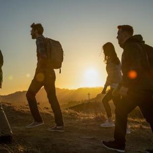 Students walk up mountain